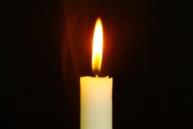 single candle burning